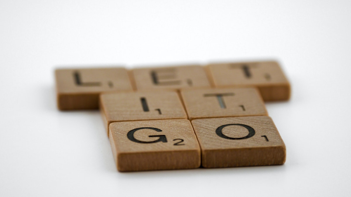 Scrabble pieces that spell out the phrase, "let it go"