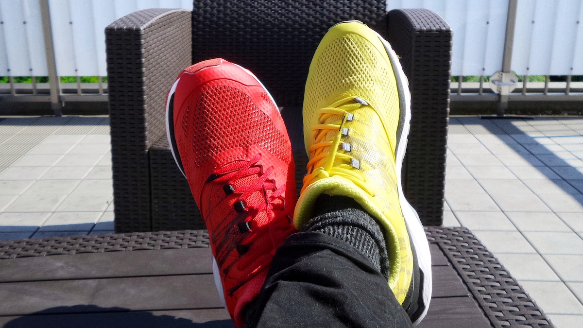 Post's featured image - Person wearing one red trainer and one yellow trainer